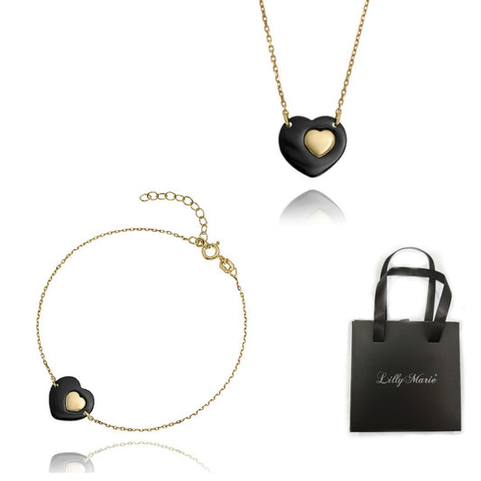 Eine vergoldete Herzkette und Armband und Verpackung für Vitrine/Geschenkläden