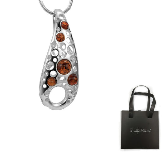 Bernsteinanhänger mit Schlangenkette und Geschenkverpackung für Vitrine/Geschenkläden