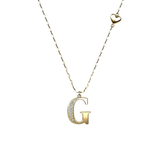 Vergoldete Ankerkette mit einem Buchstaben "G"-Anhänger und einem kleinen Herz, aus 925 Silber, Breite ca. 1 mm, Länge 42 + 3 cm