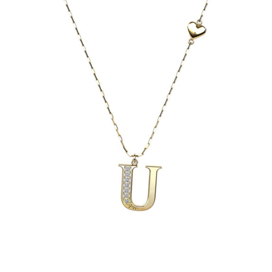 Vergoldete Ankerkette mit einem Buchstaben "U"-Anhänger und einem kleinen Herz, aus 925 Silber, Breite ca. 1 mm, Länge 42 + 3 cm